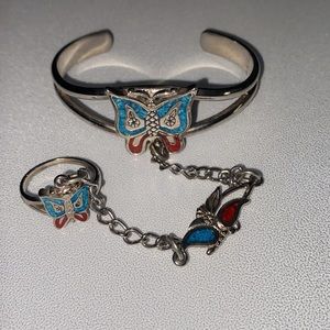 Native American bracelet with ring attached.